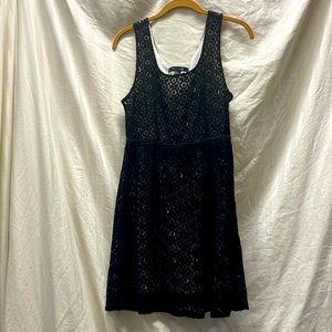 Adorable Forever 21 little black dress. Lace outer. Medium inner white slip